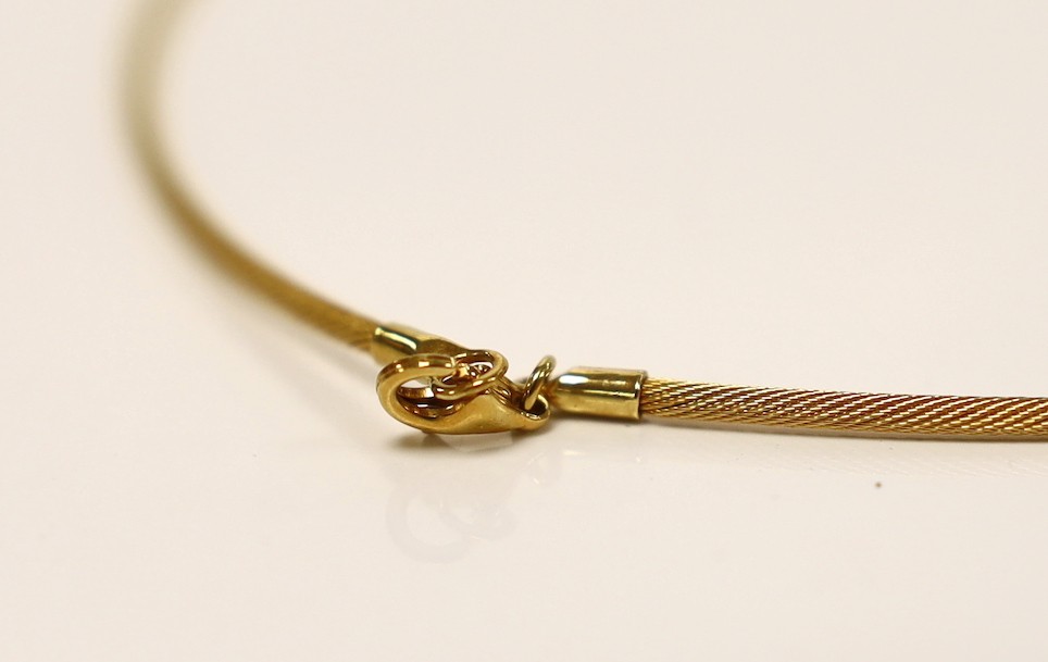 A modern 750 yellow metal and fancy cut solitaire diamond set pendant necklace, approx. 36cm, gross weight 9.3 grams.
